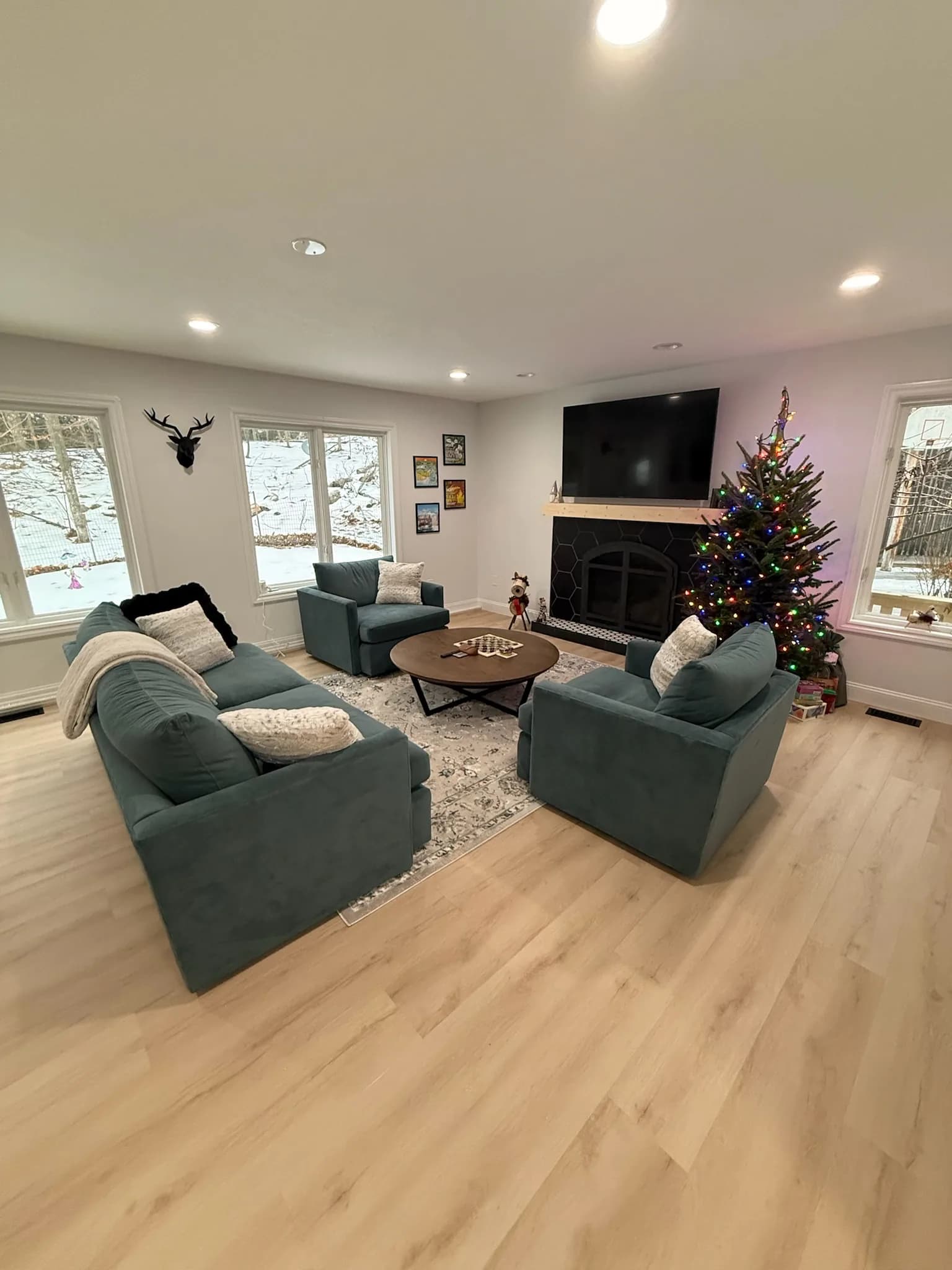 Living room with floor-to-ceiling windows and fireplace